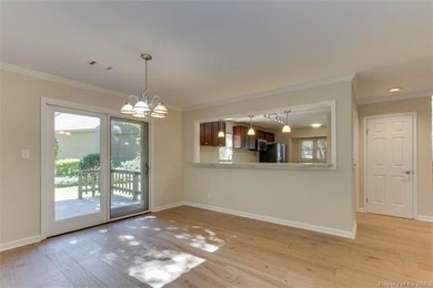 Welcome to this inviting 3-bedroom, 2.5-bath end-unit townhome on Kingsmill Resort and Golf Club in Virginia - for sale on GolfHomes.com, golf home, golf lot