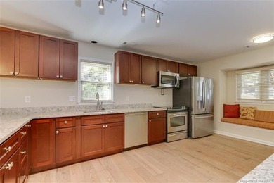 Welcome to this inviting 3-bedroom, 2.5-bath end-unit townhome on Kingsmill Resort and Golf Club in Virginia - for sale on GolfHomes.com, golf home, golf lot