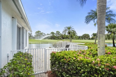 Soak in serene lake views with a backdrop of the golf course in on Santa Lucia River Club in Florida - for sale on GolfHomes.com, golf home, golf lot