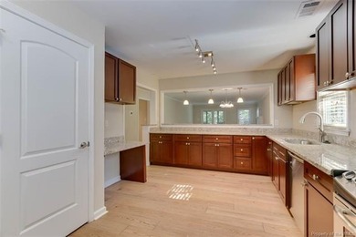 Welcome to this inviting 3-bedroom, 2.5-bath end-unit townhome on Kingsmill Resort and Golf Club in Virginia - for sale on GolfHomes.com, golf home, golf lot
