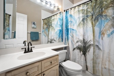 Soak in serene lake views with a backdrop of the golf course in on Santa Lucia River Club in Florida - for sale on GolfHomes.com, golf home, golf lot
