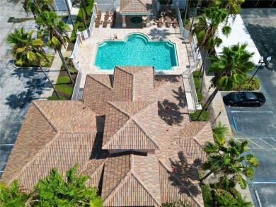 Unique and desired first floor condo in beautiful Hunters Creek on Hunters Creek Golf Course in Florida - for sale on GolfHomes.com, golf home, golf lot