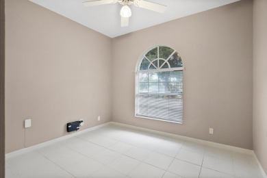 Soak in serene lake views with a backdrop of the golf course in on Santa Lucia River Club in Florida - for sale on GolfHomes.com, golf home, golf lot