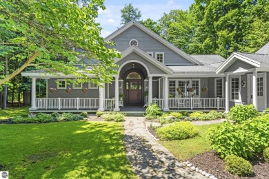 Perfectly positioned for the best of Northern Michigan living on Leland Country Club in Michigan - for sale on GolfHomes.com, golf home, golf lot