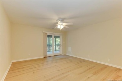 Welcome to this inviting 3-bedroom, 2.5-bath end-unit townhome on Kingsmill Resort and Golf Club in Virginia - for sale on GolfHomes.com, golf home, golf lot