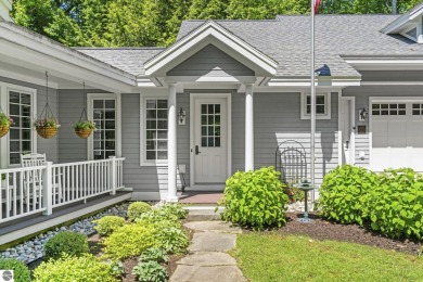 Perfectly positioned for the best of Northern Michigan living on Leland Country Club in Michigan - for sale on GolfHomes.com, golf home, golf lot