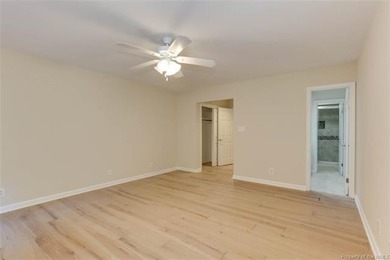 Welcome to this inviting 3-bedroom, 2.5-bath end-unit townhome on Kingsmill Resort and Golf Club in Virginia - for sale on GolfHomes.com, golf home, golf lot