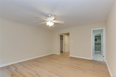 Welcome to this inviting 3-bedroom, 2.5-bath end-unit townhome on Kingsmill Resort and Golf Club in Virginia - for sale on GolfHomes.com, golf home, golf lot