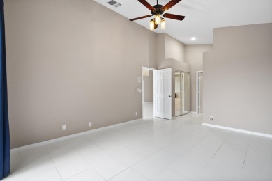 Soak in serene lake views with a backdrop of the golf course in on Santa Lucia River Club in Florida - for sale on GolfHomes.com, golf home, golf lot