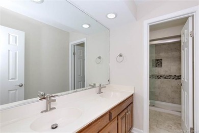 Welcome to this inviting 3-bedroom, 2.5-bath end-unit townhome on Kingsmill Resort and Golf Club in Virginia - for sale on GolfHomes.com, golf home, golf lot