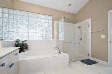 Soak in serene lake views with a backdrop of the golf course in on Santa Lucia River Club in Florida - for sale on GolfHomes.com, golf home, golf lot