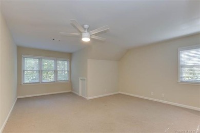 Welcome to this inviting 3-bedroom, 2.5-bath end-unit townhome on Kingsmill Resort and Golf Club in Virginia - for sale on GolfHomes.com, golf home, golf lot