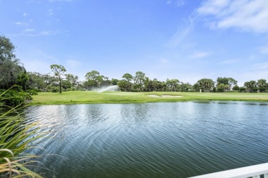 Soak in serene lake views with a backdrop of the golf course in on Santa Lucia River Club in Florida - for sale on GolfHomes.com, golf home, golf lot