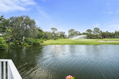 Soak in serene lake views with a backdrop of the golf course in on Santa Lucia River Club in Florida - for sale on GolfHomes.com, golf home, golf lot