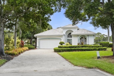 Soak in serene lake views with a backdrop of the golf course in on Santa Lucia River Club in Florida - for sale on GolfHomes.com, golf home, golf lot