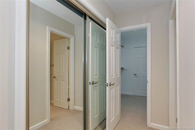 Welcome to this inviting 3-bedroom, 2.5-bath end-unit townhome on Kingsmill Resort and Golf Club in Virginia - for sale on GolfHomes.com, golf home, golf lot