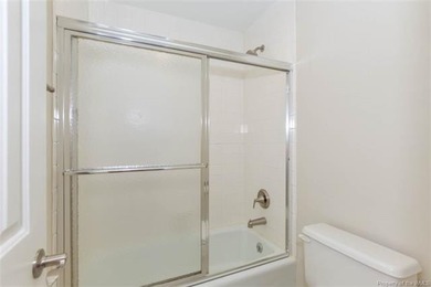 Welcome to this inviting 3-bedroom, 2.5-bath end-unit townhome on Kingsmill Resort and Golf Club in Virginia - for sale on GolfHomes.com, golf home, golf lot