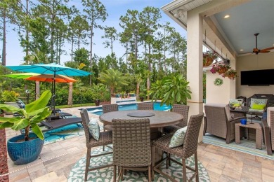 Experience luxury living in this stunning custom home in Amelia on Amelia National Golf and Country Club in Florida - for sale on GolfHomes.com, golf home, golf lot