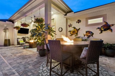 Experience luxury living in this stunning custom home in Amelia on Amelia National Golf and Country Club in Florida - for sale on GolfHomes.com, golf home, golf lot