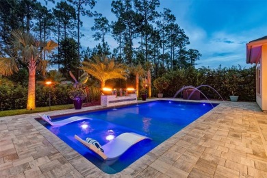 Experience luxury living in this stunning custom home in Amelia on Amelia National Golf and Country Club in Florida - for sale on GolfHomes.com, golf home, golf lot