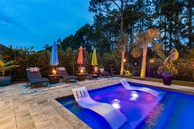 Experience luxury living in this stunning custom home in Amelia on Amelia National Golf and Country Club in Florida - for sale on GolfHomes.com, golf home, golf lot