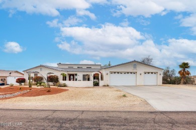 Step into comfort and style with this spacious 4-bedroom, 2 on London Bridge Golf Course in Arizona - for sale on GolfHomes.com, golf home, golf lot