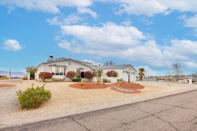 Step into comfort and style with this spacious 4-bedroom, 2 on London Bridge Golf Course in Arizona - for sale on GolfHomes.com, golf home, golf lot