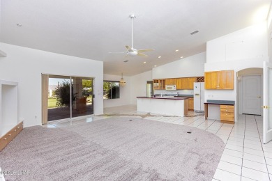 Step into comfort and style with this spacious 4-bedroom, 2 on London Bridge Golf Course in Arizona - for sale on GolfHomes.com, golf home, golf lot