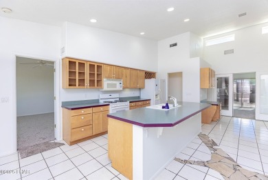 Step into comfort and style with this spacious 4-bedroom, 2 on London Bridge Golf Course in Arizona - for sale on GolfHomes.com, golf home, golf lot
