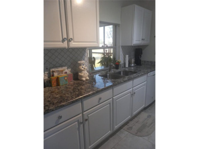 Adorable and affordable ! Very nicely updated home with granite on River Isles Golf Club in Florida - for sale on GolfHomes.com, golf home, golf lot