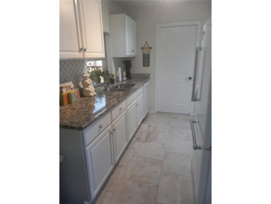 Adorable and affordable ! Very nicely updated home with granite on River Isles Golf Club in Florida - for sale on GolfHomes.com, golf home, golf lot