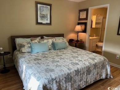 This corner unit golf course condo is tucked away in a serene on True Blue Plantation in South Carolina - for sale on GolfHomes.com, golf home, golf lot