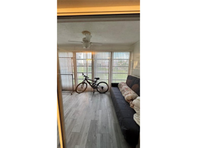 Call this your new home in a spacious and updated furnished on Sunrise Lakes Phase IV Golf Course in Florida - for sale on GolfHomes.com, golf home, golf lot