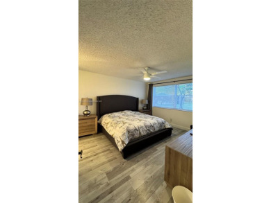 Call this your new home in a spacious and updated furnished on Sunrise Lakes Phase IV Golf Course in Florida - for sale on GolfHomes.com, golf home, golf lot