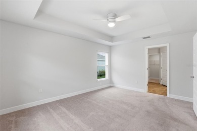 Beautifully maintained 4-bedroom, 2-bath pool home situated on a on Deep Creek Golf Club in Florida - for sale on GolfHomes.com, golf home, golf lot