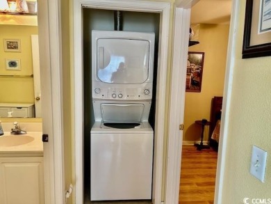 This corner unit golf course condo is tucked away in a serene on True Blue Plantation in South Carolina - for sale on GolfHomes.com, golf home, golf lot