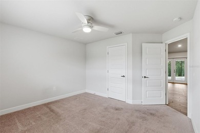 Beautifully maintained 4-bedroom, 2-bath pool home situated on a on Deep Creek Golf Club in Florida - for sale on GolfHomes.com, golf home, golf lot