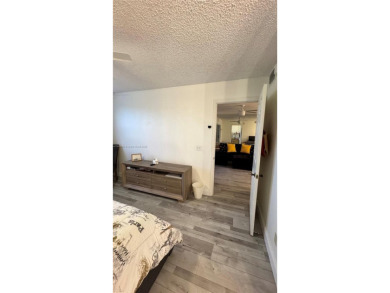 Call this your new home in a spacious and updated furnished on Sunrise Lakes Phase IV Golf Course in Florida - for sale on GolfHomes.com, golf home, golf lot
