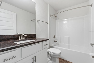 Beautifully maintained 4-bedroom, 2-bath pool home situated on a on Deep Creek Golf Club in Florida - for sale on GolfHomes.com, golf home, golf lot