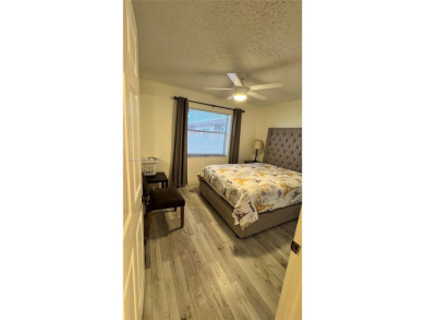 Call this your new home in a spacious and updated furnished on Sunrise Lakes Phase IV Golf Course in Florida - for sale on GolfHomes.com, golf home, golf lot