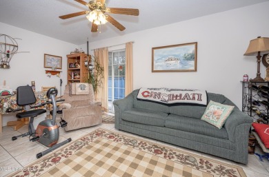 This charming one-owner, 2,424sf home is nestled in a desirable on Mississippi National Golf Course in Mississippi - for sale on GolfHomes.com, golf home, golf lot