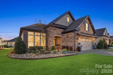 Experience elegant, low-maintenance living in the coveted on The Palisades Country Club in North Carolina - for sale on GolfHomes.com, golf home, golf lot