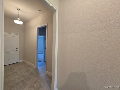 Handsome, inviting, and move-in ready, this 3-bedroom, 2-bath on Twisted Oaks Golf Club in Florida - for sale on GolfHomes.com, golf home, golf lot