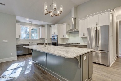 This beautiful 3BR/3.5BA custom built home by Greenwatch on Lockwood Folly Country Club in North Carolina - for sale on GolfHomes.com, golf home, golf lot