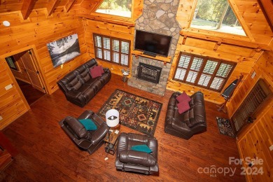 Discover this exceptional 1.5-story log home nestled in a on Lake Louise Golf Club in North Carolina - for sale on GolfHomes.com, golf home, golf lot