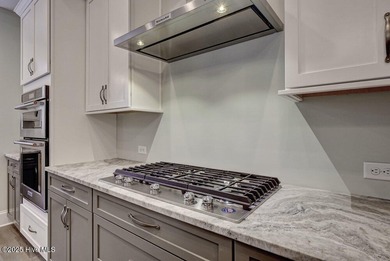 This beautiful 3BR/3.5BA custom built home by Greenwatch on Lockwood Folly Country Club in North Carolina - for sale on GolfHomes.com, golf home, golf lot