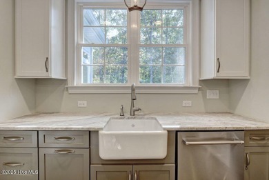 This beautiful 3BR/3.5BA custom built home by Greenwatch on Lockwood Folly Country Club in North Carolina - for sale on GolfHomes.com, golf home, golf lot