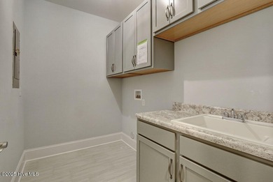 This beautiful 3BR/3.5BA custom built home by Greenwatch on Lockwood Folly Country Club in North Carolina - for sale on GolfHomes.com, golf home, golf lot