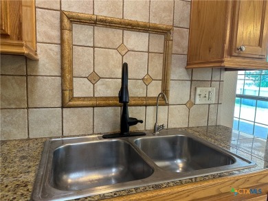 Beautiful custom 4BD/2BA home located just a golf cart ride away on Gatesville Country Club in Texas - for sale on GolfHomes.com, golf home, golf lot