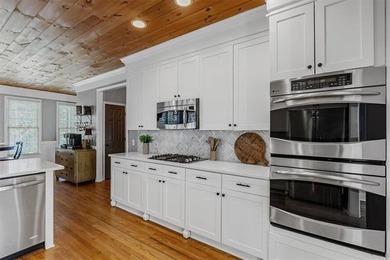 This stunning luxury home at 4027 Hickory Fairway Drive on The Golf Club At Bradshaw Farm in Georgia - for sale on GolfHomes.com, golf home, golf lot